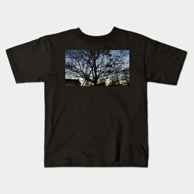 London Eye view thru trees near it Kids T-Shirt by fantastic-designs